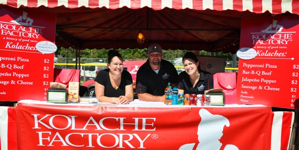 Serving food from the Brentwood Kolache Factory are (from left) Jonna Leonard, Ryan Smith and Jenni Smith.