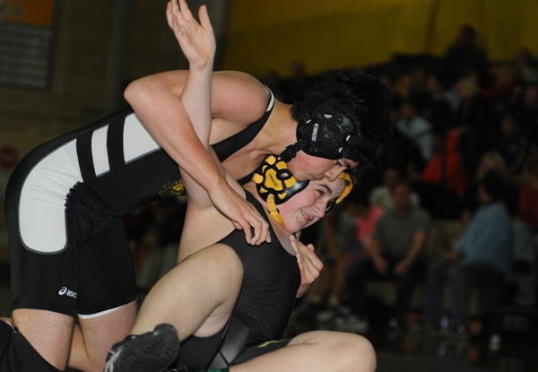 Caleb Murphy (bottom) takes on Alex Dippold of Lutheran South.