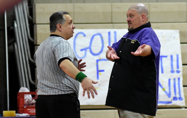 Roy Hughes questions a referee during Chase Lynch's match with Cleveland's Joshua Garner.